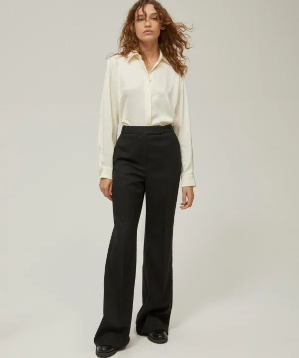 Pantaloni gessati con paillettes